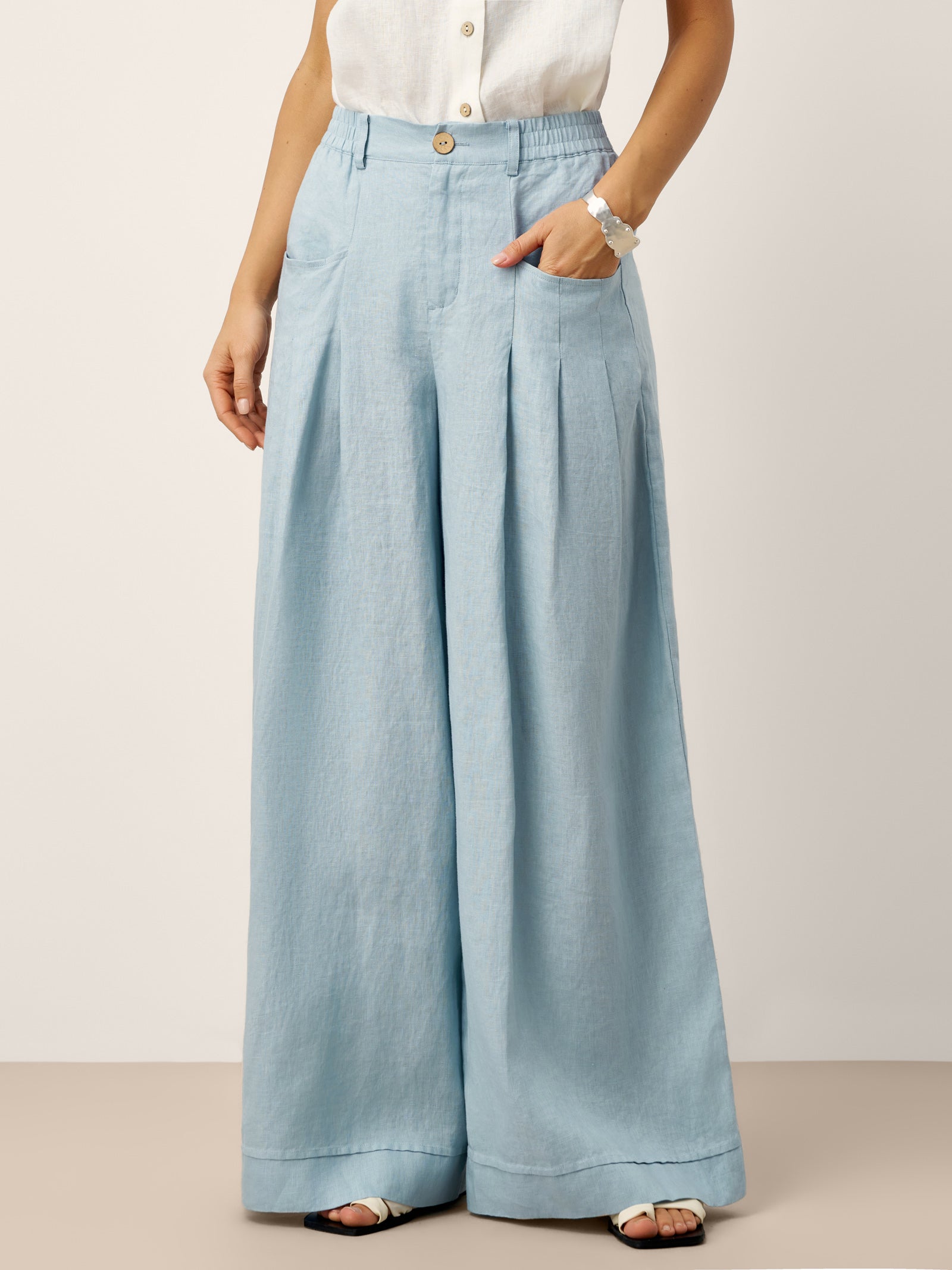 Pantalones VERIDIANA de lino 100% con pliegues esculpidos y espalda elástica, de corte relajado