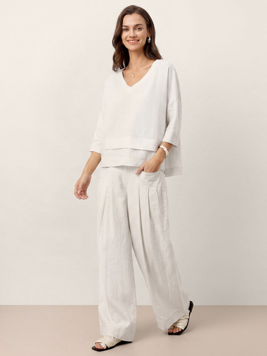 Pantalones VERIDIANA de lino 100% con pliegues esculpidos y espalda elástica, de corte relajado