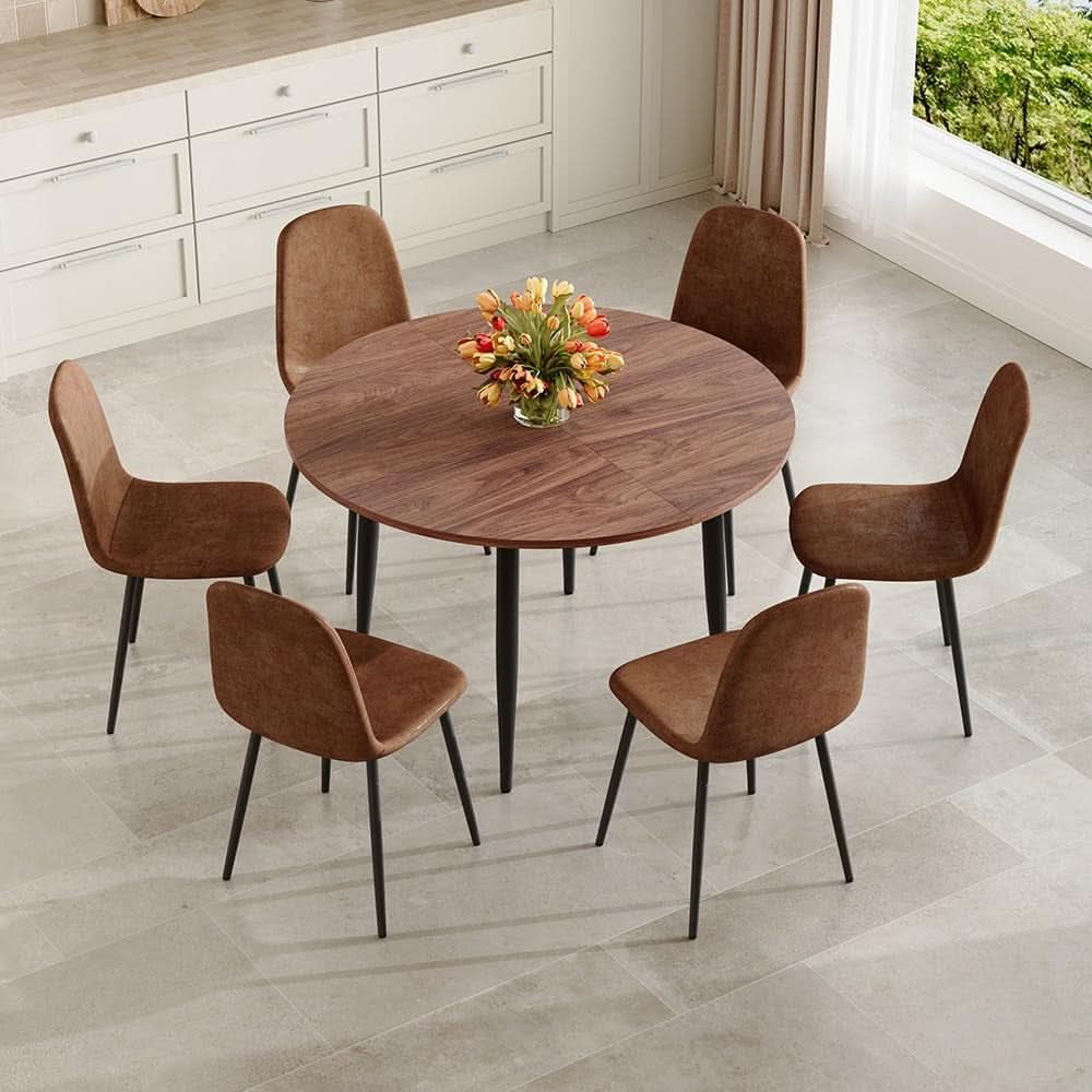 Juego de comedor extensible de nogal con seis sillas tapizadas