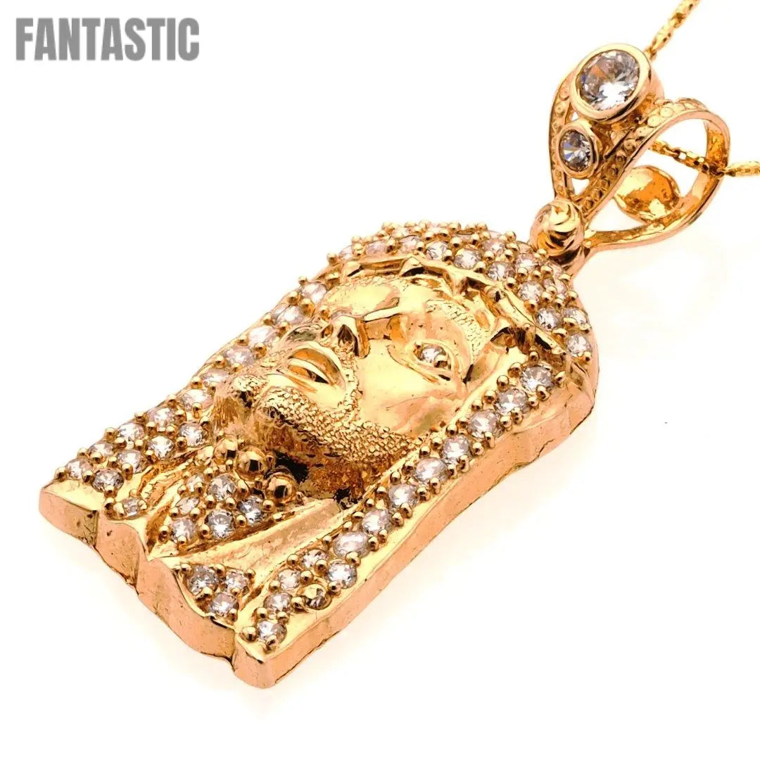 Colgante de oro de 14 quilates con la cara de Jesús adornado con circonitas cúbicas - Fantastic Jewelry NYC