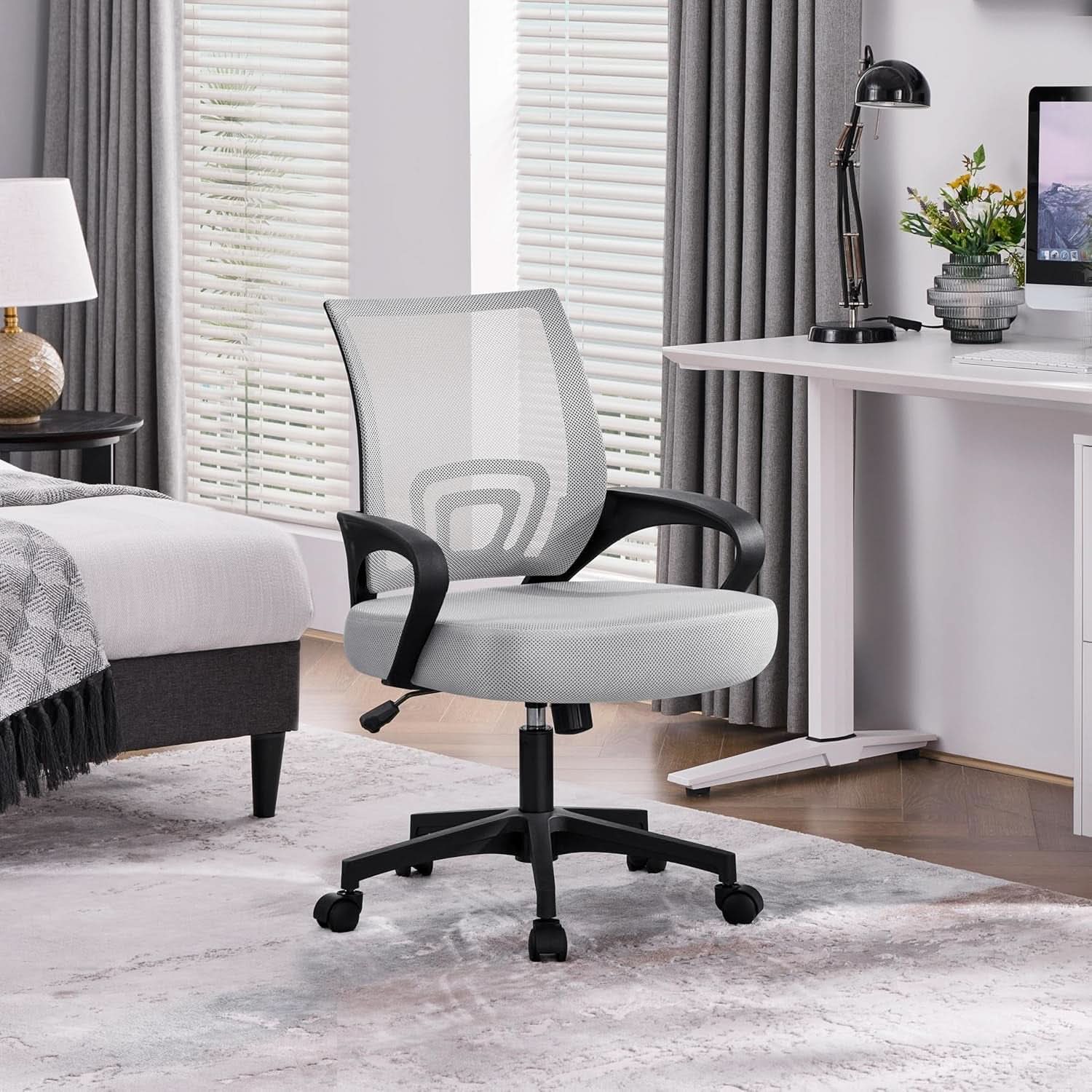 Silla de oficina ergonómica de malla con soporte lumbar, gris