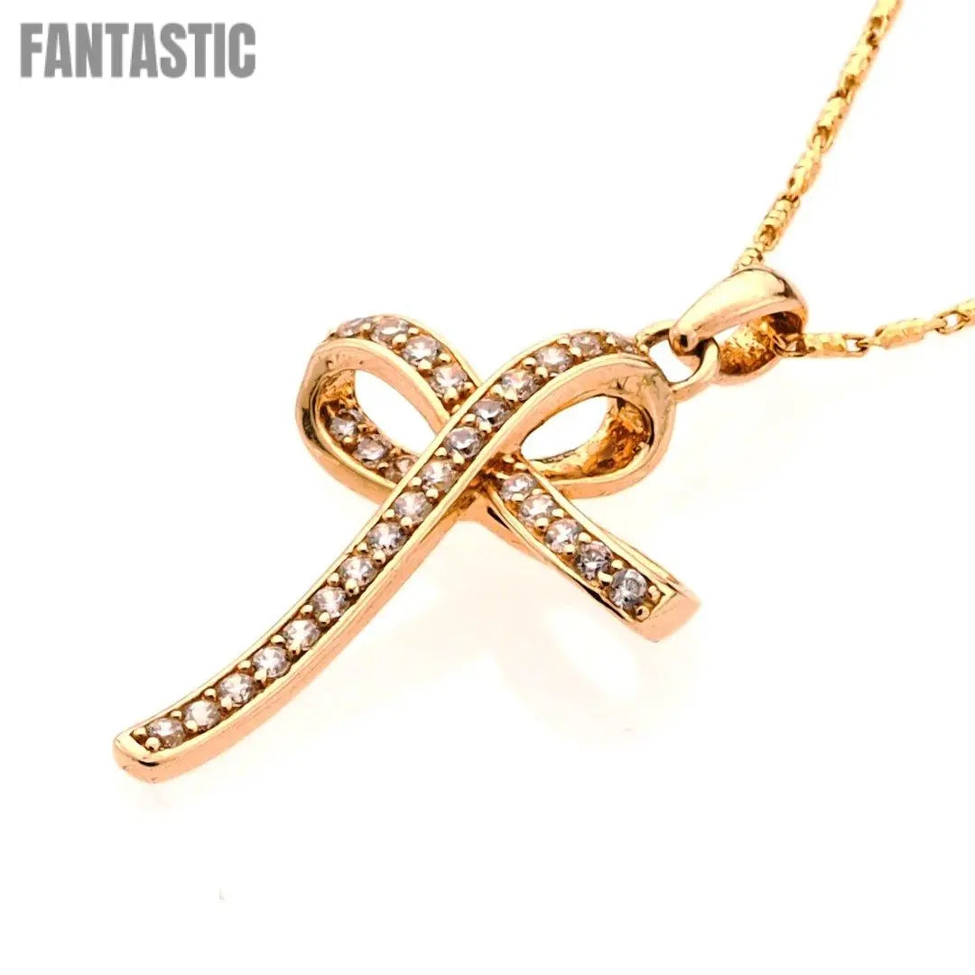 Elegant Cross Brilliance: 14K Gold Pendant with Intricate Cross Design and CZ Accents