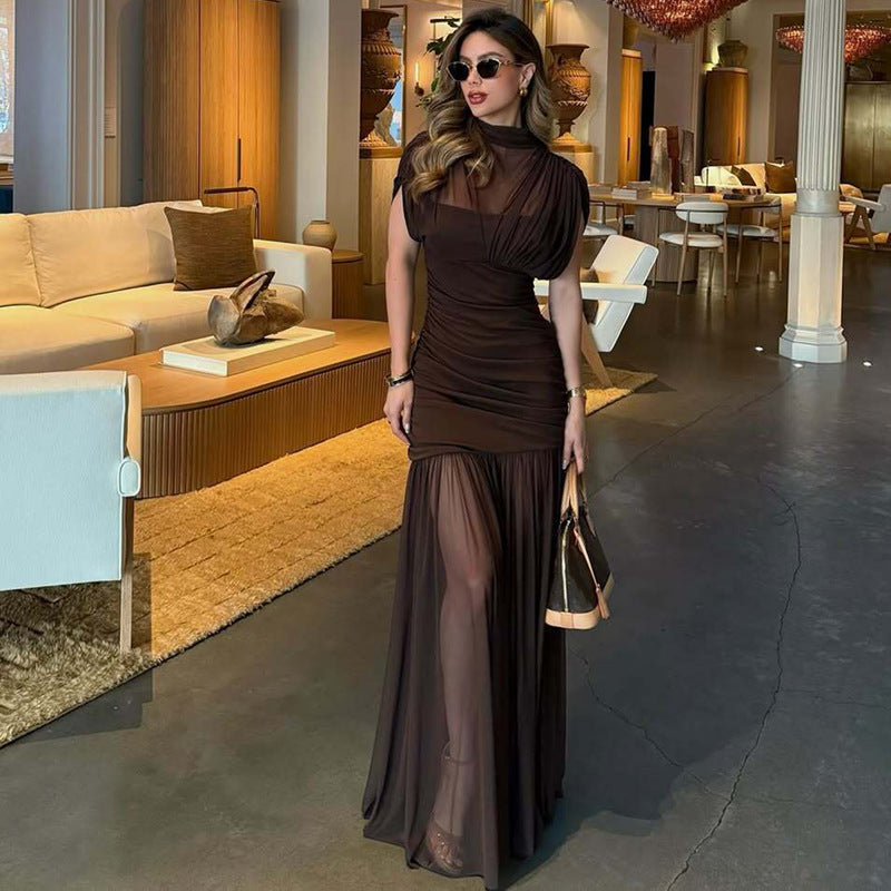 Vestido largo de mujer sexy de socialité, con cintura ajustada, costuras ceñidas y dobladillo vaporoso.