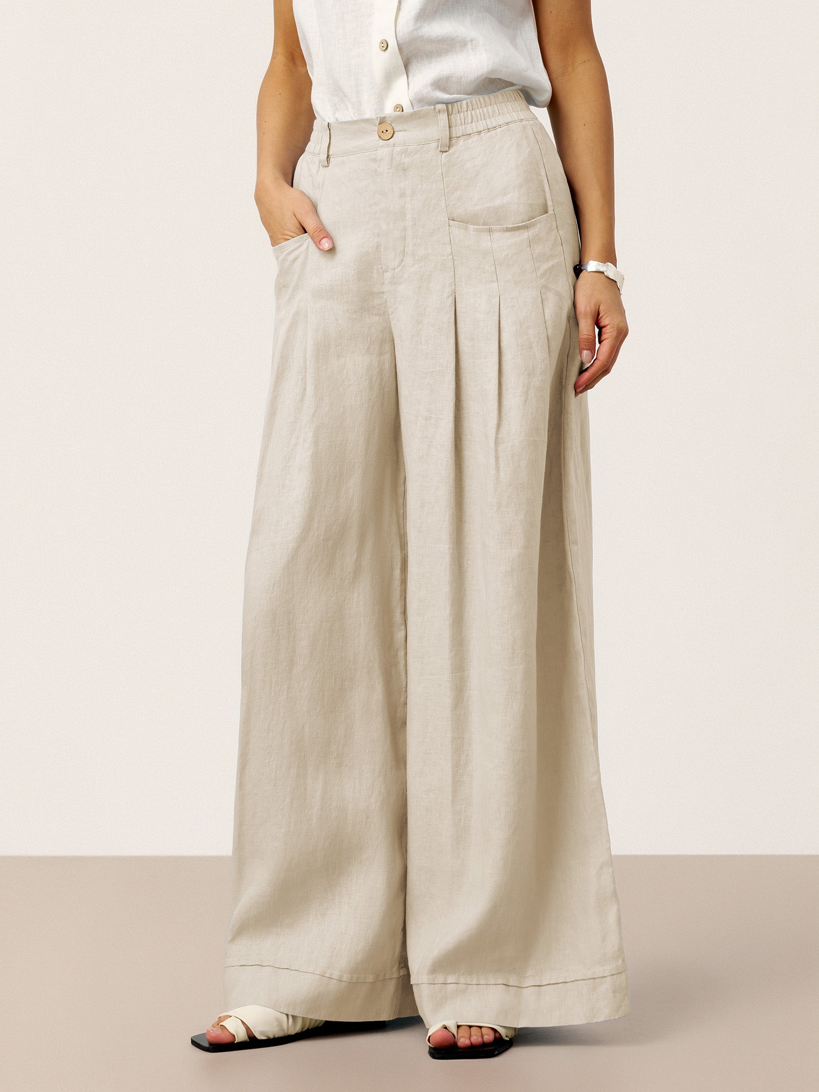 Pantalones VERIDIANA de lino 100% con pliegues esculpidos y espalda elástica, de corte relajado