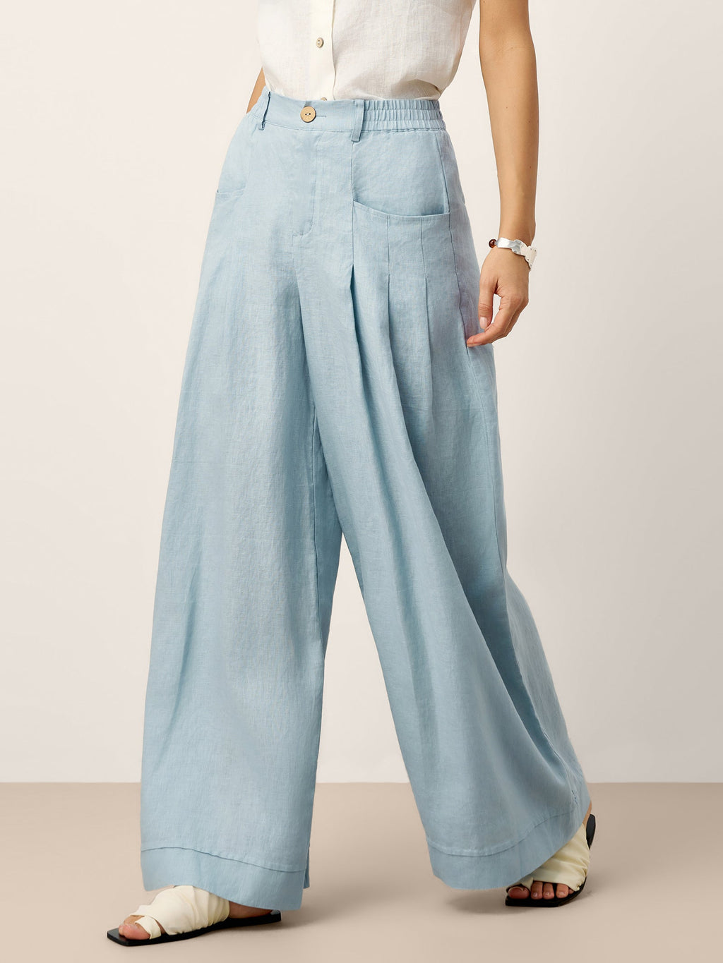 Pantalones VERIDIANA de lino 100% con pliegues esculpidos y espalda elástica, de corte relajado