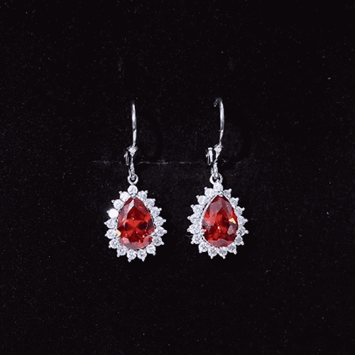 5 Carat Lab Grown Orange Sapphire Teardrop Earrings With Moissanite Halo Accents