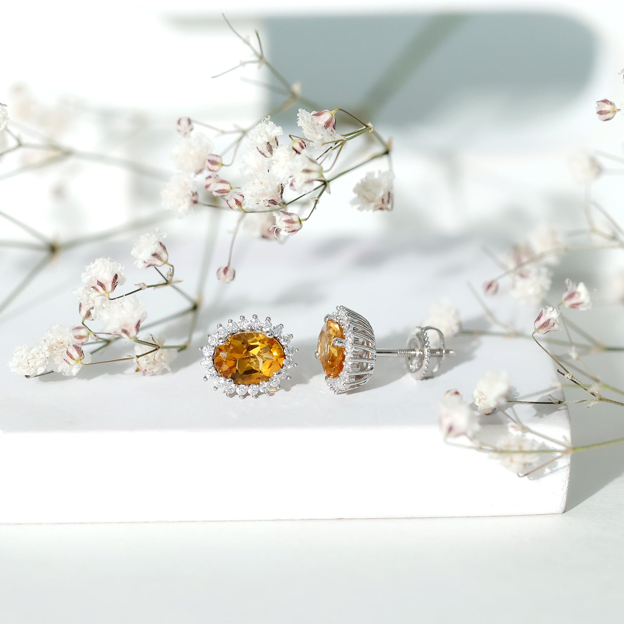 Oval Shaped 2.2 Carat Citrine Stud Earrings with Halo