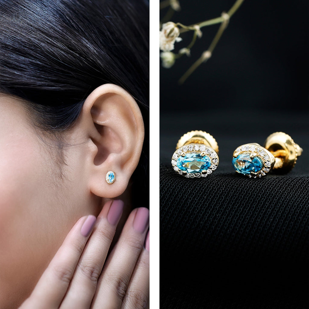 Pendientes de topacio azul suizo natural con halo de diamantes