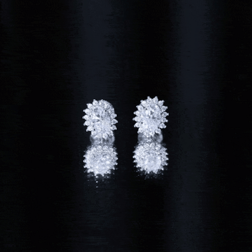 2 Carat Oval Moissanite Halo Stud Earrings In Sterling Silver