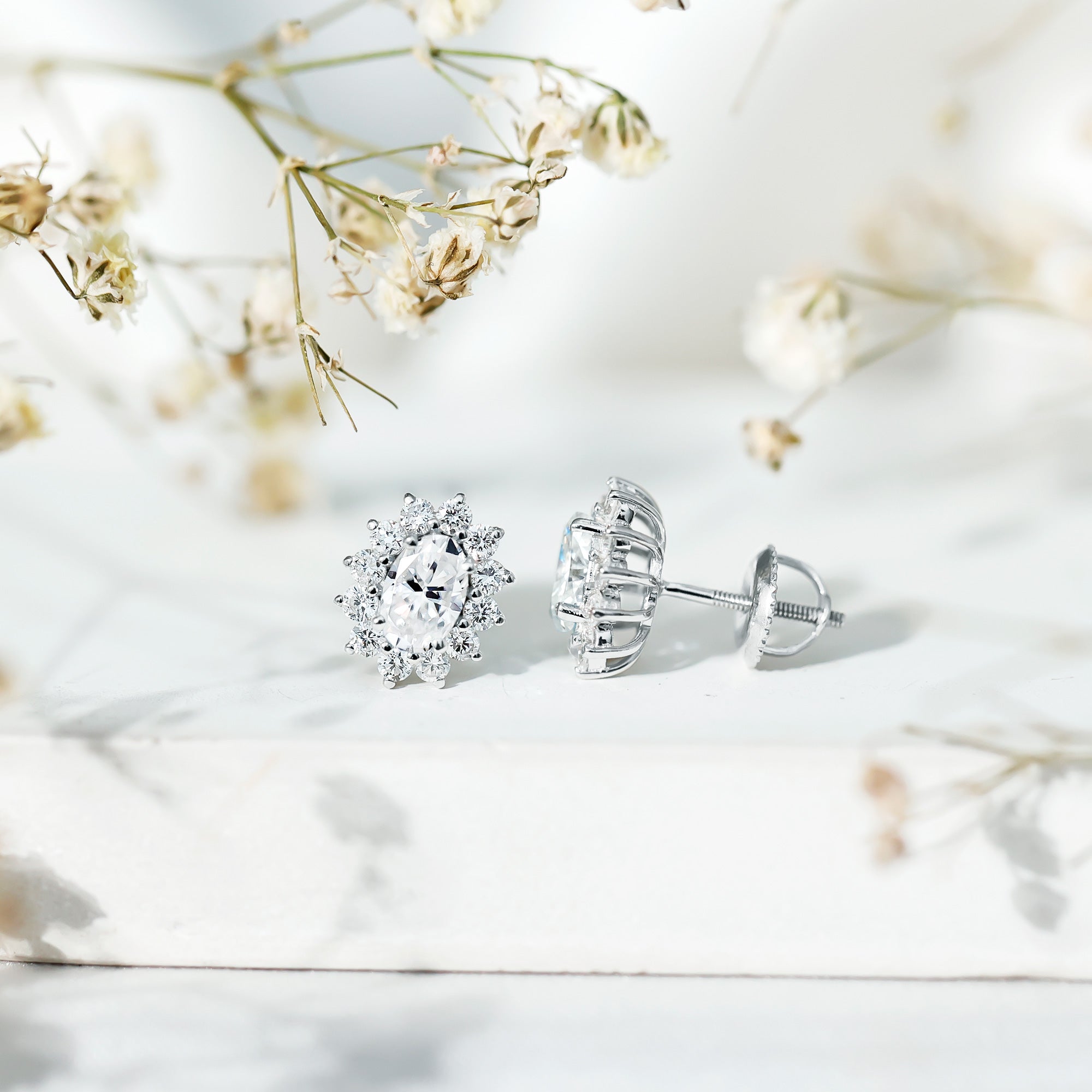 Certified Oval Shaped Moissanite Halo Stud Earrings in Silver