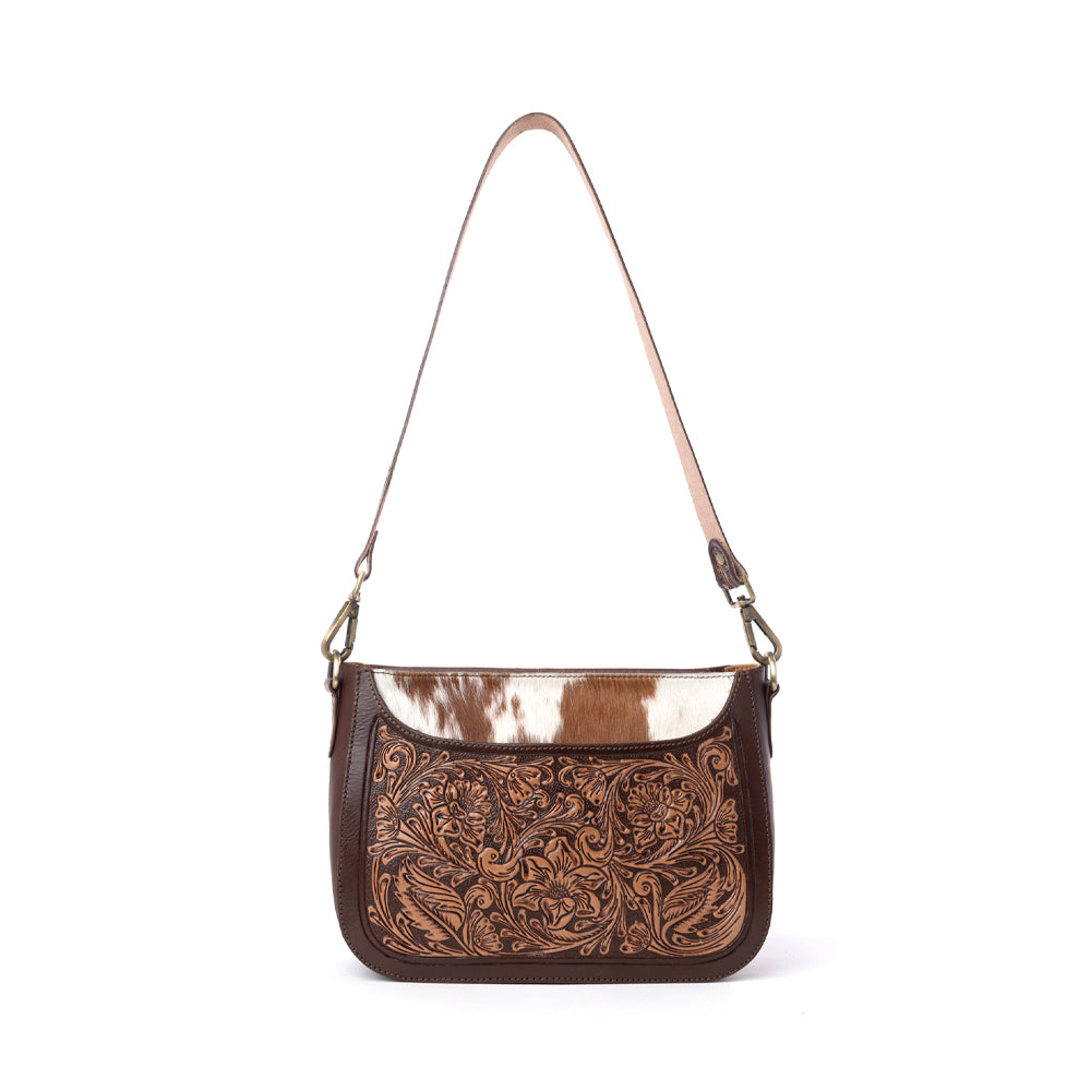 Myra Copper Crest Clutch aus handpunziertem Hairon-Leder in Sattel-Walnuss