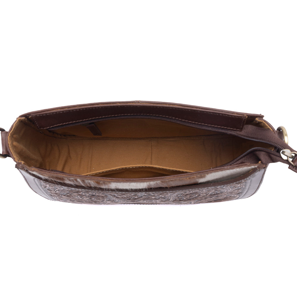 Myra Copper Crest Clutch aus handpunziertem Hairon-Leder in Sattel-Walnuss