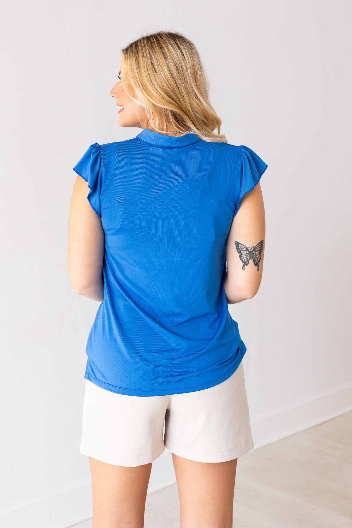 Top Nicole con cuello en V, azul