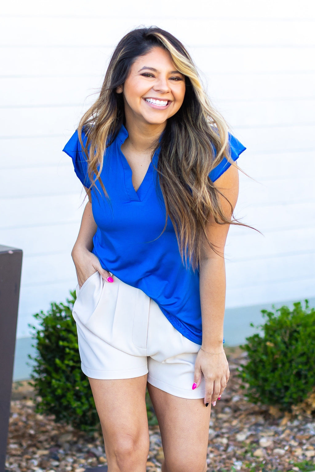 Top Nicole con cuello en V, azul