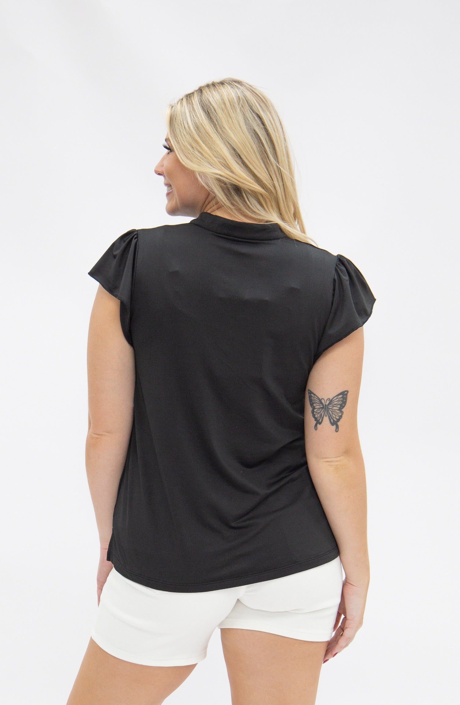 Top Nicole con cuello en V, negro