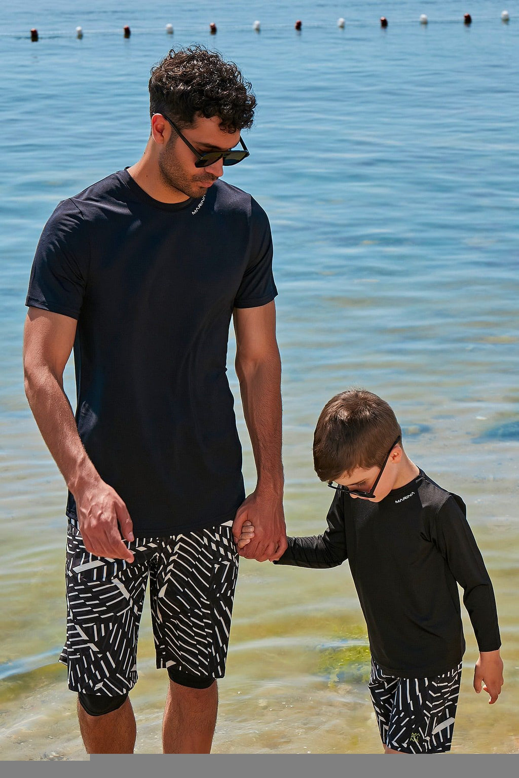 Camisetas de baño de licra negras para hombre T2341