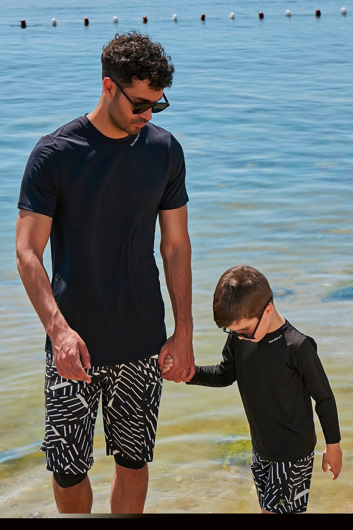 Camisetas de baño de licra negras para hombre T2341