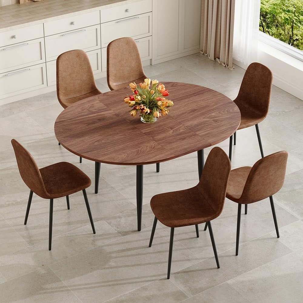 Juego de comedor extensible de nogal con seis sillas tapizadas