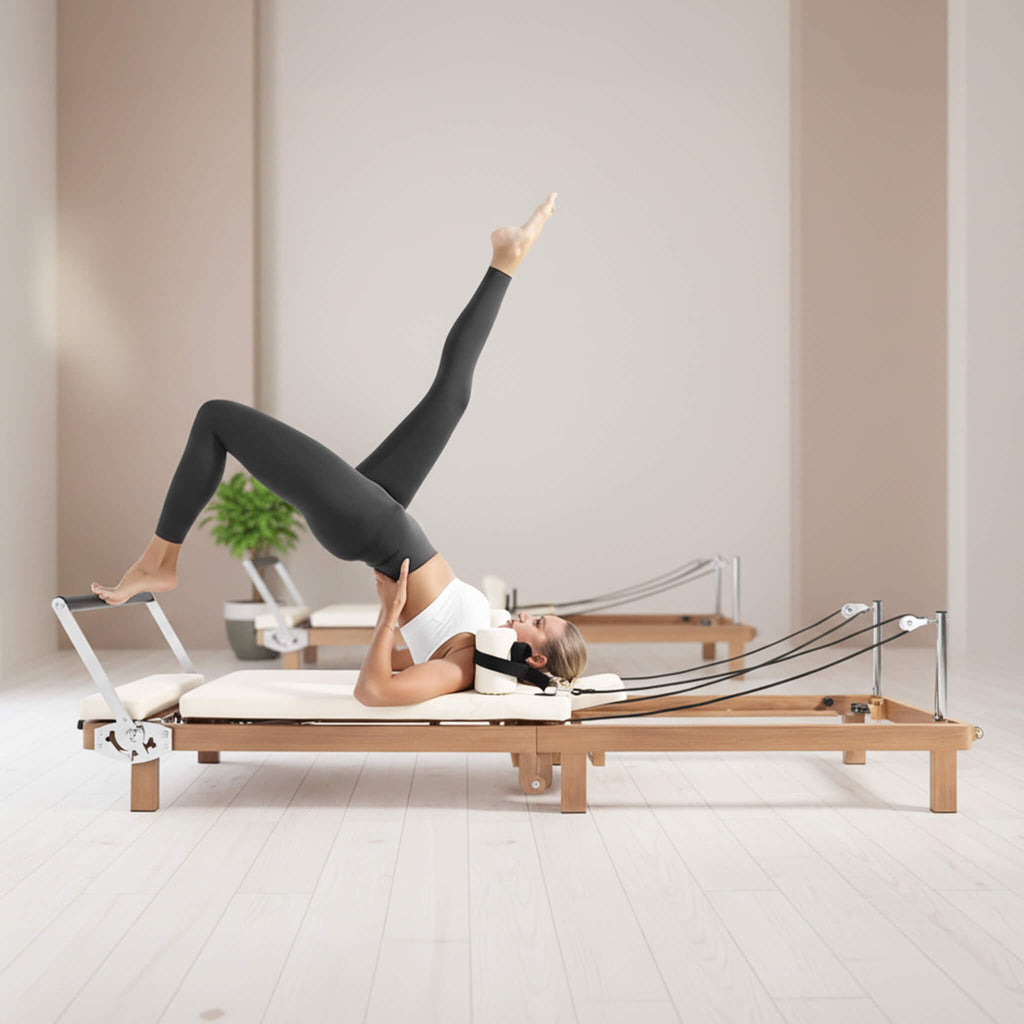 Reformer de Pilates plegable con doble resistencia y tabla de salto Core Pilates Apex (SAK83914)